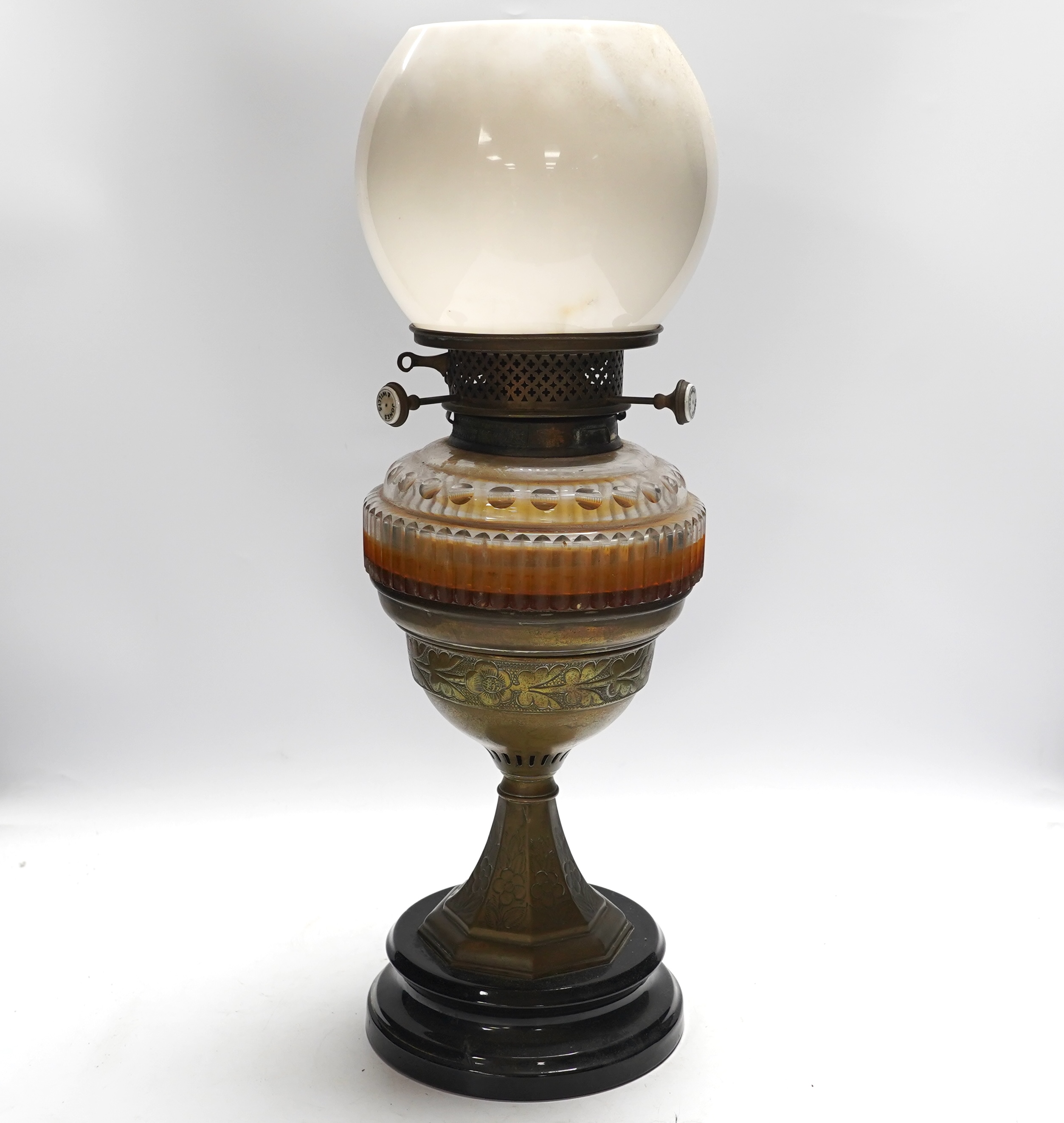 A Victorian glass and brass oil lamp by Jones & Willis, 53cm high